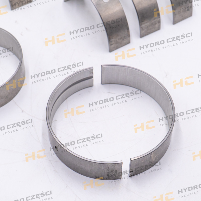 Втулки вала JCB +0,25 мм (верхняя/нижняя сторона с фиксатором) — AZERI PARTS