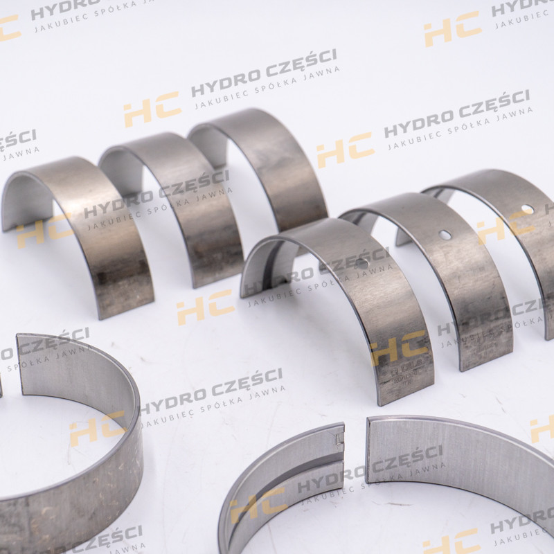 Втулки вала JCB +0,25 мм (верхняя/нижняя сторона с фиксатором) — AZERI PARTS